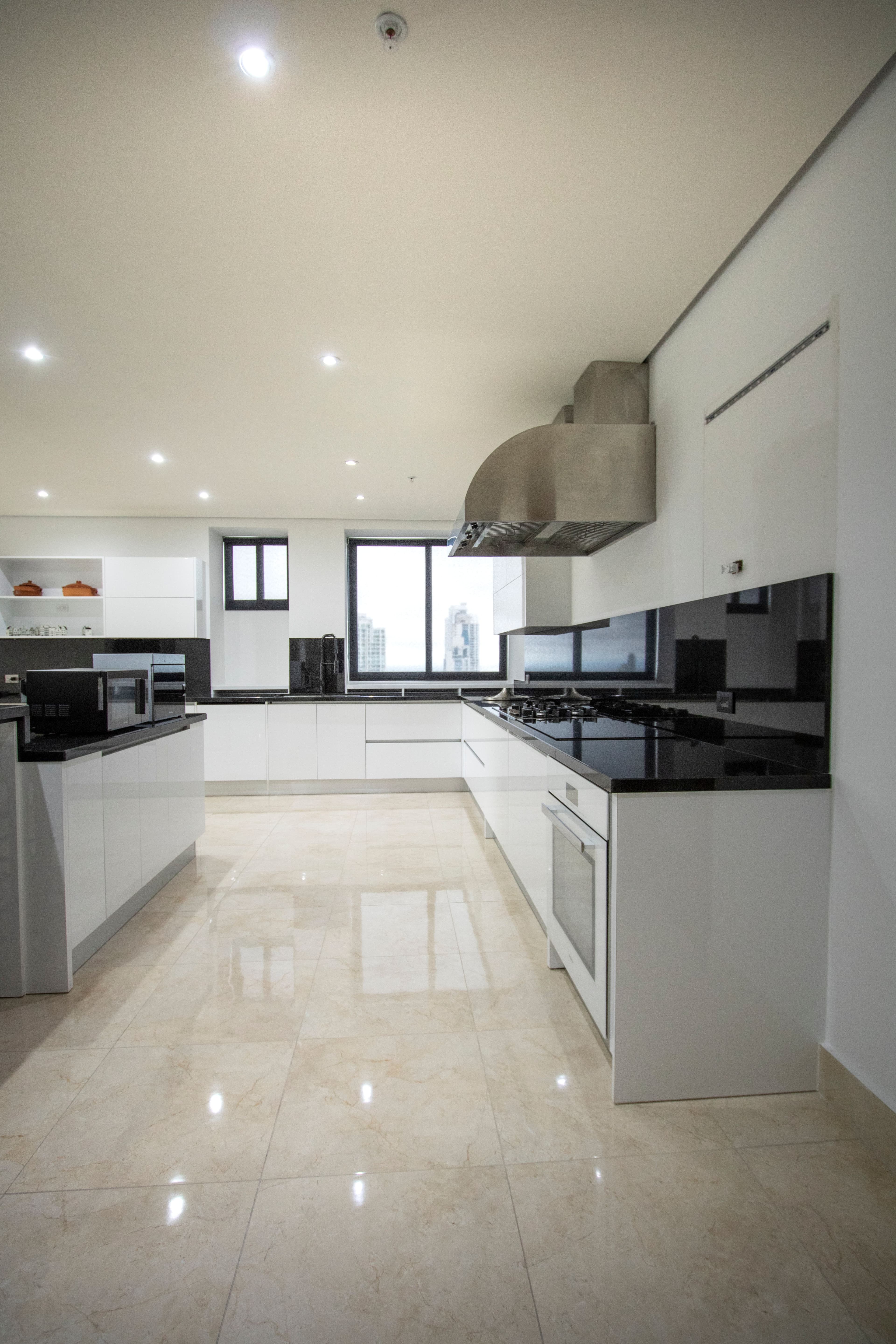 Luxurious modern kitchen with granite countertops and stainless steel appliances