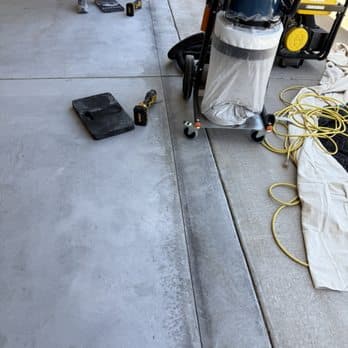 Epoxy garage floor coating in Albuquerque home by NM Concrete Coating Pros