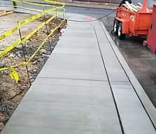 Concrete sidewalk poured along a curb — Danielsville, PA