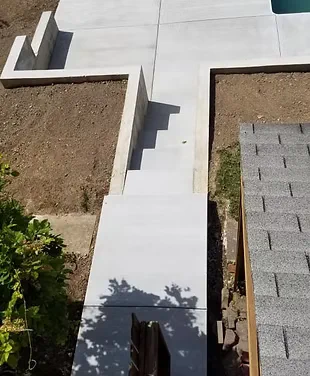 Concrete sidewalk poured along a curb — Danielsville, PA
